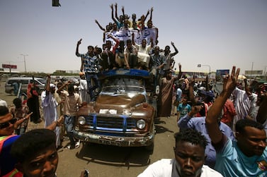 Sudanese protesters gather near the military headquarters in the capital Khartoum, during a rally on April 27, 2019. AFP