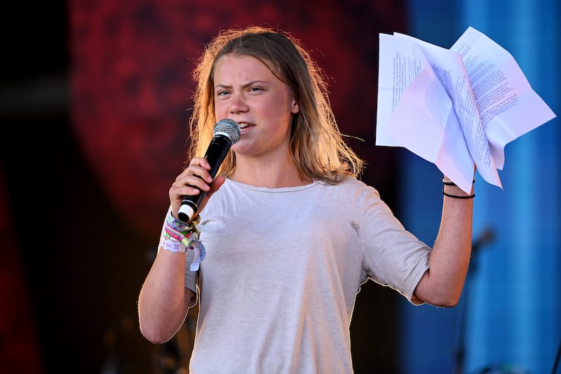 Swedish climate activist Greta Thunberg makes a speech on the Pyramid Stage stage during the Glastonbury Festival at Worthy Farm, England, in June. All photos: Getty Images