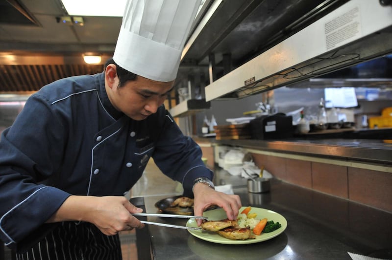 A chef preparing a Halal meal at the Gaia Hotel, which caters to tourists from Muslim-dominant countries, in the Beitou district near Taipei. Mandy Cheng / AFP