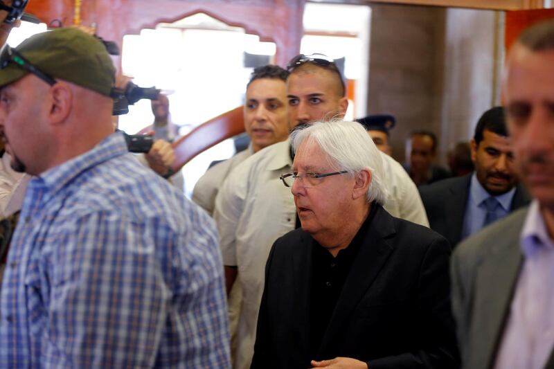 U.N. envoy to Yemen Martin Griffiths is escorted by bodyguards during his departure at Sanaa airport in Sanaa, Yemen, June 5, 2018. REUTERS/Khaled Abdullah