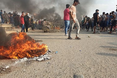 Protesters set fire to barricades during violent demonstrations in eastern Baghdad, Iraq, on October 4, 2019. A wave of unrest and violent protests in Iraq have left at least 100 people dead and thousands injured. EPA