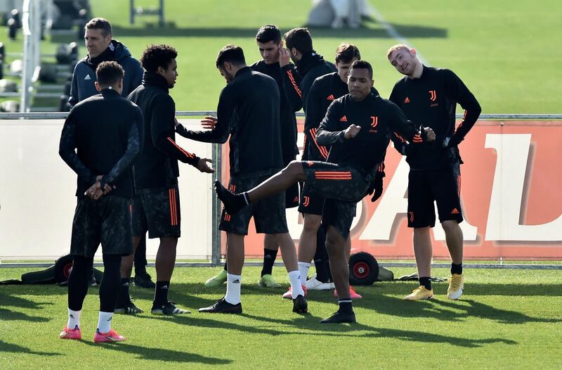Juve full-back Alex Sandro, front right, during training