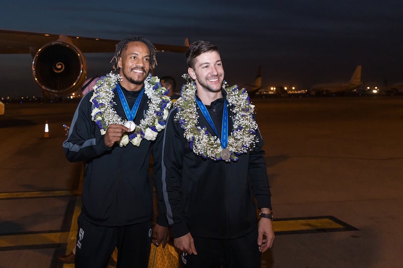Andre Carrillo and Luciano Vietto walk from the plane after returning to Riyadh. Photo: Al Hilal