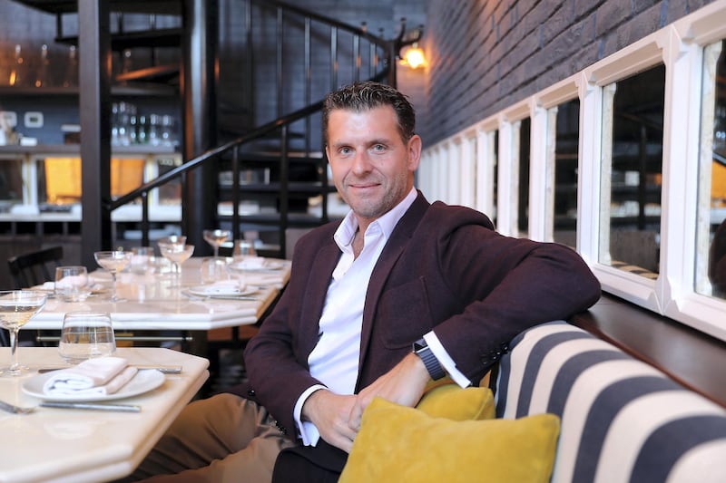 DUBAI , UNITED ARAB EMIRATES , February 06 – 2019 :- Spero Panagakis, co-owner of the BB Social Dining restaurant at DIFC Gate Village 8 in Dubai. ( Pawan Singh / The National ) For Business. Story by Nada El Sawy