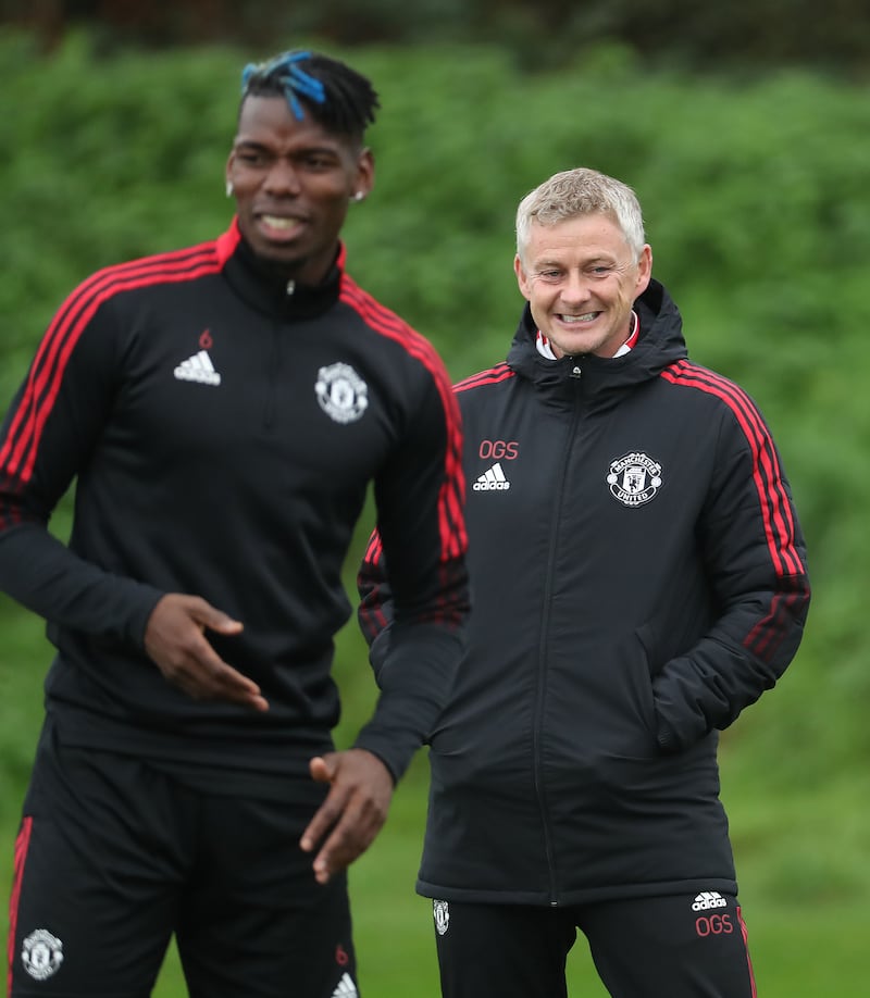 Paul Pogba and Manchester United manager Ole Gunnar Solskjaer in buoyant mood.