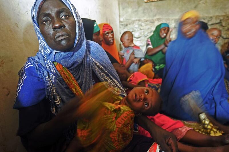 Displaced Somali women and their children receive medical treatment on the outskirts of Mogadishu. Mohamed Abdiwahab / AFP