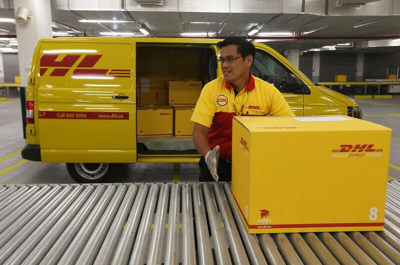 DHL’s new head office and logistics centre features a 300-metre long conveyor and sorting belt and offers more than 10 times the space that was previously available. Pawan Singh / The National