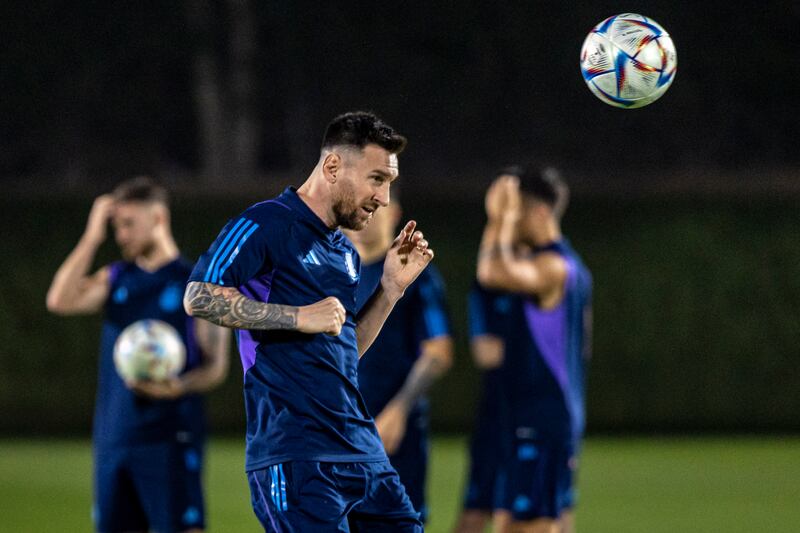 Lionel Messi heads the ball during an Argentina training session. EPA