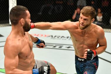 ABU DHABI, UNITED ARAB EMIRATES - JULY 16: In this handout image provided by UFC, (R-L) Calvin Kattar punches Dan Ige in their featherweight fight during the UFC Fight Night event inside Flash Forum on UFC Fight Island on July 16, 2020 in Yas Island, Abu Dhabi, United Arab Emirates. (Photo by Jeff Bottari/Zuffa LLC via Getty Images)