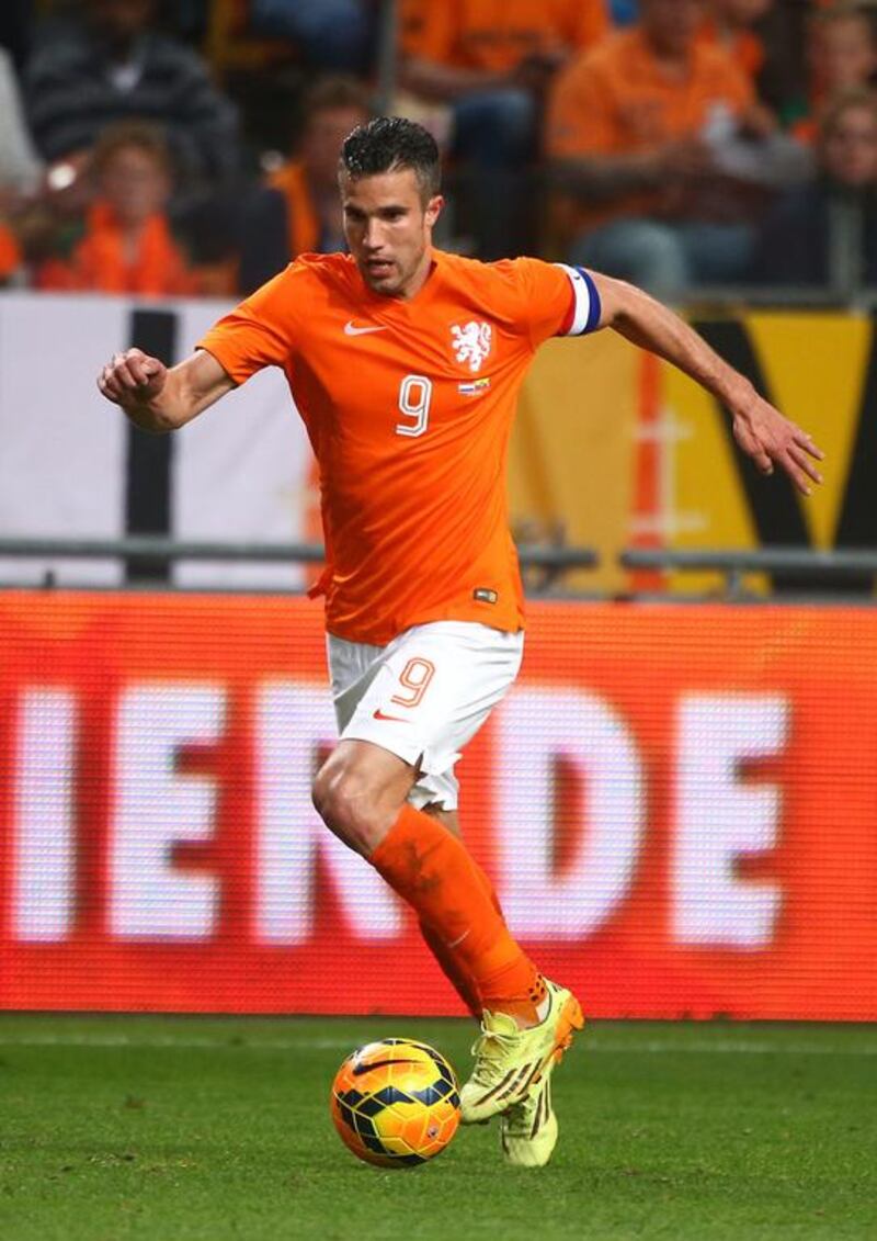 Robin van Persie, striker (Manchester United); Age 30; 82 caps. Scored 11 goals in the 2014 World Cup qualifiers, breaking the overall Dutch scoring record in the process by taking his tally to 41 - exactly one goal every two games for his country. Captain of the national team since last year and enjoys a close relationship with coach Van Gaal. Controversially moved from Arsenal to Manchester United to win trophies and took the league in his first season but has suffered only disappointment and injury in the current campaign, the highlight being his hat-trick against Olympiakos in the Champions League. Charlie Crowhurst / Getty Images