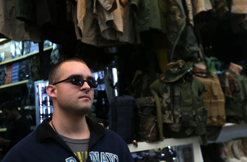 Louis Park shops for military equipment at a market in the Iraqi city of Dohuk.