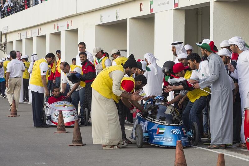 During the Electric Grand Prix stage on Thursday, students had to see how far they could drive their vehicles using just battery power for one hour. Mona Al-Marzooqi / The National