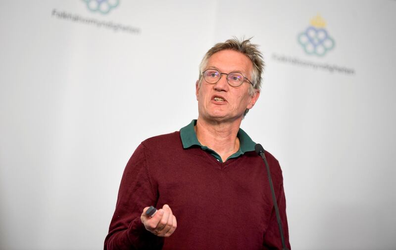 FILE PHOTO: Anders Tegnell, the state epidemiologist of the Public Health Agency of Sweden speaks during a news conference about the daily update on the coronavirus disease (COVID-19) situation, in Stockholm, Sweden May 27, 2020. Pontus Lundahl/TT News Agency/via REUTERS/File Photo      ATTENTION EDITORS - THIS IMAGE WAS PROVIDED BY A THIRD PARTY. SWEDEN OUT. NO COMMERCIAL OR EDITORIAL SALES IN SWEDEN.