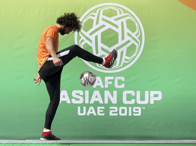 Al Ain, United Arab Emirates - October 22, 2018: Baraa Lulu shows his skills. School children take part in different activities to promote the AFC Asian Cup. Monday, October 22nd, 2018 at Hazza Bin Zayed Stadium, Al Ain. Chris Whiteoak / The National