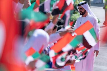 Sheikh Mohammed bin Rashid, Vice President and Ruler of Dubai, heaped praise on a school worker from Al Ain for her cheery demeanour with pupils. Courtesy Dubai Media Office