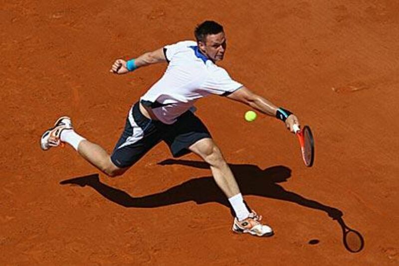 Robin Soderling, above, was rarely stretched by Laurent Recouderc in his first-round match.