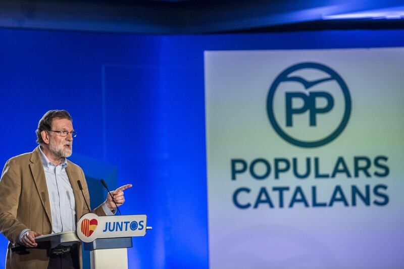 Mariano Rajoy, Spain's prime minister and leader of the People's Party (PP), gestures as he speaks during an election campaign event in Barcelona, Spain, on Sunday, Nov. 12, 2017. "I want to ask all companies that have worked or work in Catalonia not to leave," Rajoy says in speech. Photographer: Angel Garcia/Bloomberg