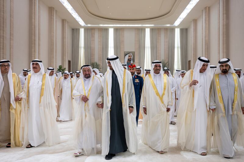 President Sheikh Mohamed, centre, receives Sheikh Dr Sultan bin Muhammad Al Qasimi, Ruler of Sharjah, third left, during an Eid Al Fitr reception at Mushrif Palace. Pictured with Sheikh Mohammed bin Rashid, Vice President, Prime Minister and Ruler of Dubai, far right, Sheikh Saud bin Saqr Al Qasimi, Ruler of Ras Al Khaimah, sixth from left, Sheikh Hamad bin Mohammed Al Sharqi, Ruler of Fujairah, fifth from left, Sheikh Saud bin Rashid Al Mualla, Ruler of Umm Al Quwain, second from left, and Sheikh Mansour bin Zayed Al Nahyan, UAE Vice President and Deputy Prime Minister, far left. Abdulla Al Neyadi / UAE Presidential Court 