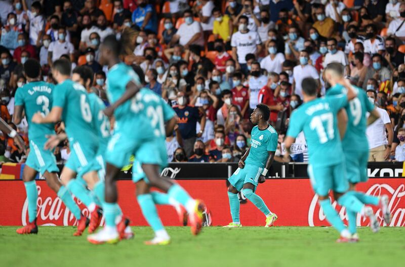 Vinicius Junior celebrates after scoring the equalising goal against Valencia. Getty Images