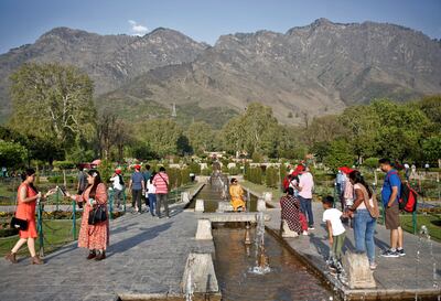 Tourists visit Nishat Garden in Srinagar, India. The country's passport is recovering from the Covid-19 pandemic. Reuters