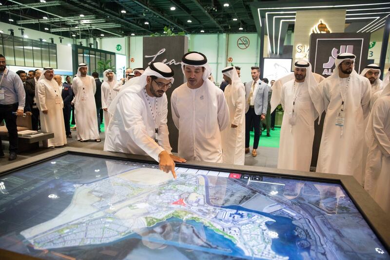 ABU DHABI, UNITED ARAB EMIRATES - April 16, 2019: HH Sheikh Hazza bin Zayed Al Nahyan, Vice Chairman of the Abu Dhabi Executive Council (2nd L), attends the opening of Cityscape Abu Dhabi, at Abu Dhabi National Exhibition Centre (ADNEC). 

( Mohammed Al Blooshi for Ministry of Presidential Affairs )
---