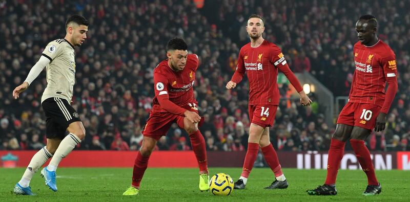 Alex Oxlade-Chamberlain on the ball during Liverpool's game against Manchester United. AFP