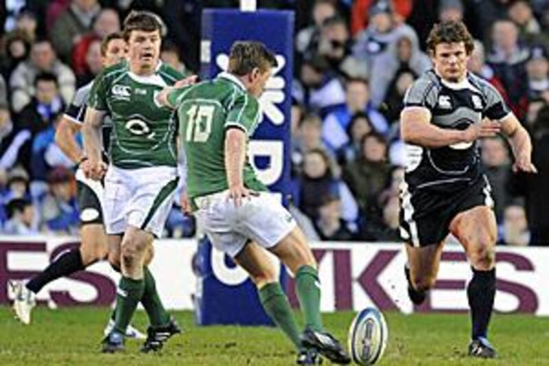 Ireland's Ronan O'Gara strikes a drop goal against Scotland. O'Gara became the tournament's most prolific points scorer at Murrayfield.