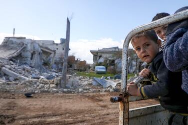 Displaced Syrian boys in the village of AL Nayrab in Idlib, March 29, 2020. AFP