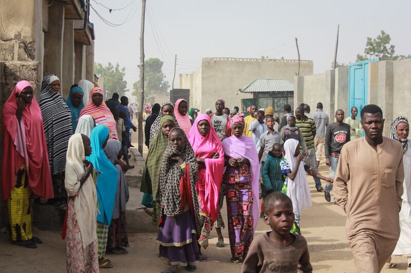 People walk in the streets of Sajeri village in Nigeria. Nigeria is one of eight countries that will account for more than half of the increase in global population up to 2050. AFP