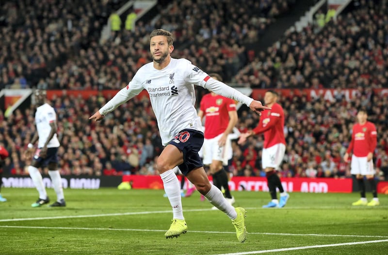 MANCHESTER, ENGLAND - OCTOBER 20:  Adam Lallana of Liverpool celebrates after scoring his sides first goal during the Premier League match between Manchester United and Liverpool FC at Old Trafford on October 20, 2019 in Manchester, United Kingdom. (Photo by Alex Livesey/Getty Images)