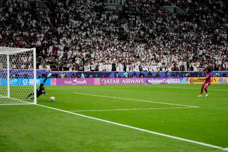 Qatar's Akram Afif scores his penalty. AP