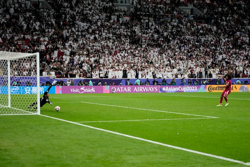 Qatar's Akram Afif scores his penalty. AP