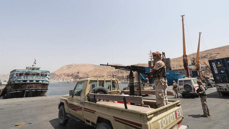 A Yemeni government soldier mans a machine gun mounted on a pickup truck at the docks in Mukalla. AFP
