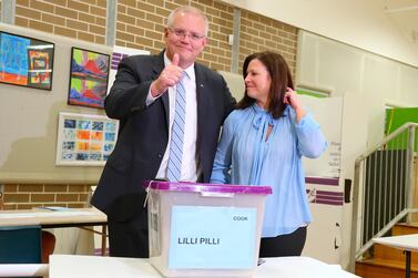 Scott Morrison, Australia's prime minister, with wife Jenny Morrison after casting his ballot in Sydney. Bloomberg