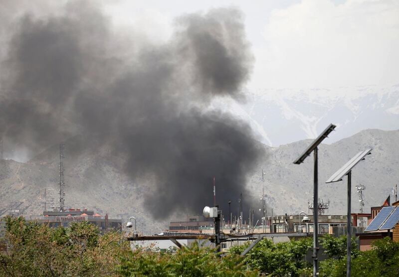 Smokes rises in the distance after the blast. AP