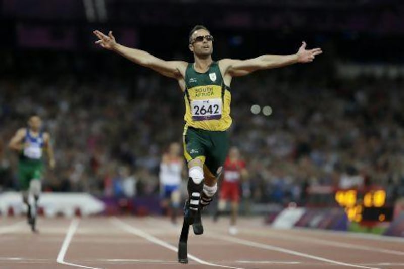 South Africa's Oscar Pistorius wins gold in the men's 400-metre T44 final at the 2012 Paralympics, in London.