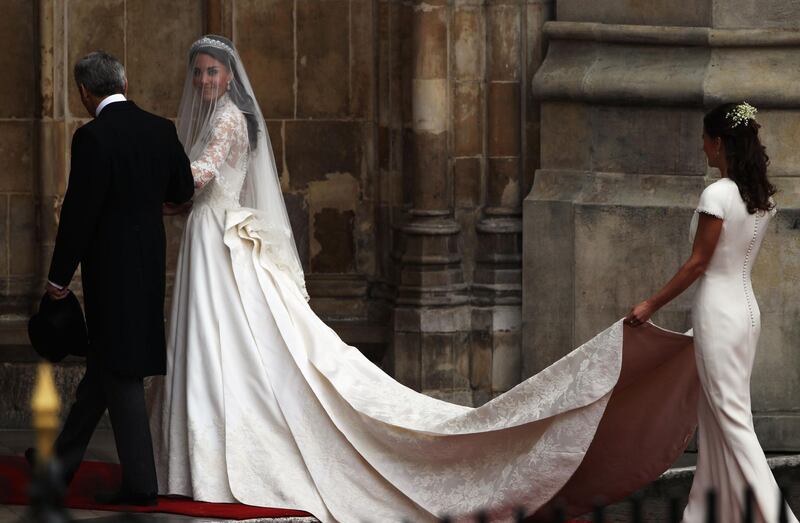 LONDON, ENGLAND - APRIL 29:  Catherine Middleton arrives with her father Michael Middleton to attend the Royal Wedding of Prince William to Catherine Middleton at Westminster Abbey on April 29, 2011 in London, England. The marriage of the second in line to the British throne is to be led by the Archbishop of Canterbury and will be attended by 1900 guests, including foreign Royal family members and heads of state. Thousands of well-wishers from around the world have also flocked to London to witness the spectacle and pageantry of the Royal Wedding.  (Photo by Dan Kitwood/Getty Images)