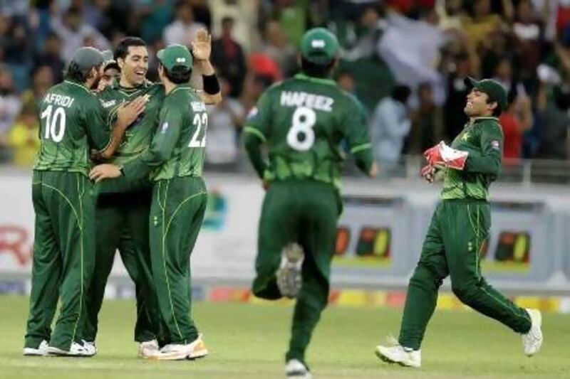 Pakistan's Umar Gul, second left, was man-of-the-match in the first Twenty20.
