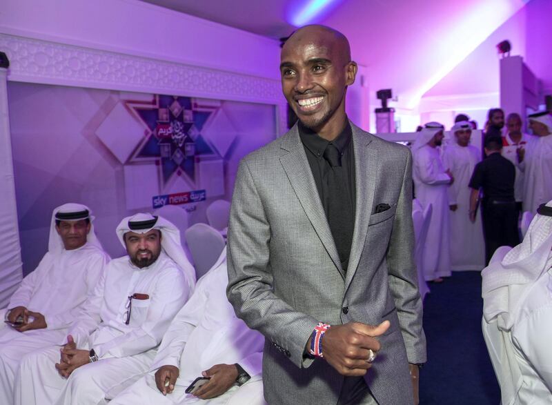 Abu Dhabi, United Arab Emirates, May 22, 2019.    Suhur with Legends at Sky News Arabia HQ.  (R)  Mo Farah, British Olympic gold medallist, arrives at the Suhur.
Victor Besa/The National
Section:   SP
Reporter:  Amith Passela