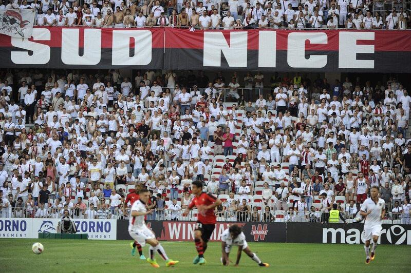 Nice’s supporters cheer during the French Ligue 1 football match between OGC Nice and Rennes on August 14, 2016, at the Allianz Riviera stadium in Nice, southern France. Franck Pennant / AFP