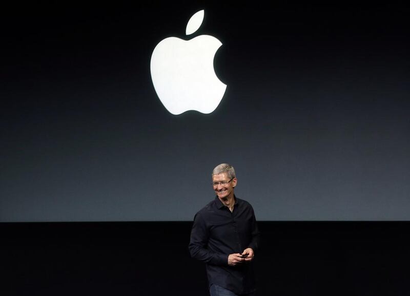 Tim Cook this year forfeited more than 7,000 restricted stock units because of the company’s stock performance to August from a year earlier. AP Photo/Marcio Jose Sanchez