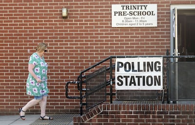 A voter arrives at a polling station at Trinity Pre-School in Wakefield. PA