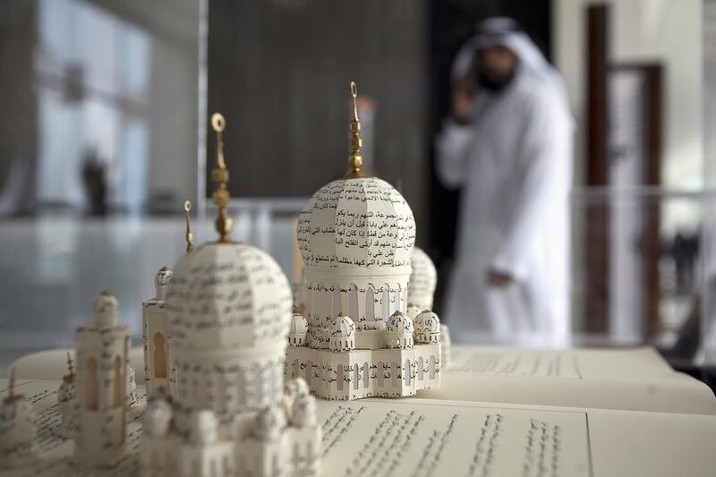 The mosque model, which took about two weeks to complete, is built out of an Arabic translation of the 1001 Arabian Nights book. Silvia Razgova / The National