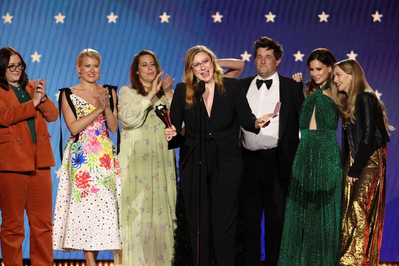 Liz Hannah, Jordana Mollick, Elizabeth Meriwether, Michael Showalter, Rebecca Jarvis and Amanda Seyfried accept the Best Limited Series award for The Dropout. Reuters