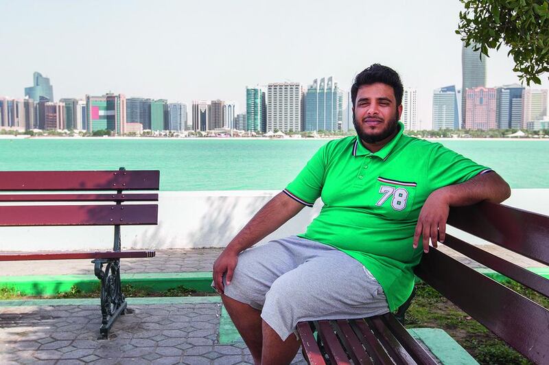 When Ali Abdulla isn't working as a policeman, a big part of his life involves football. Mona Al-Marzooqi/ The National 