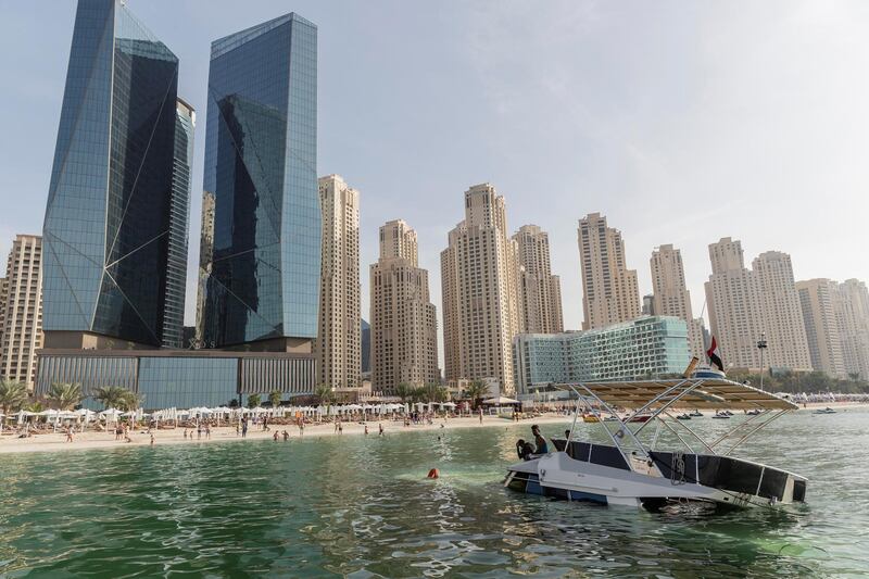 DUBAI, UNITED ARAB EMIRATES.  08 JANUARY 2019. A sunken yacht being salvaged by it���s owner Mohamed Irfan and some volunteer divers off the beach on JBR. (Photo: Antonie Robertson/The National) Journalist: None. Section: National.