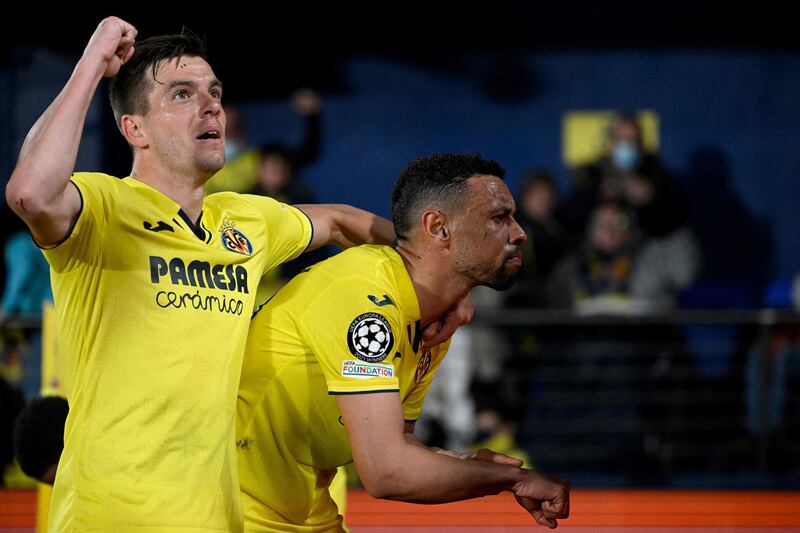 Francis Coquelin celebrates (R) after scoring a goal that was later ruled out. AFP