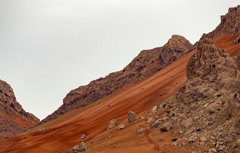 Off-road enthusiasts go dune bashing on a mountainside in Sharjah. Chris Whiteoak / The National