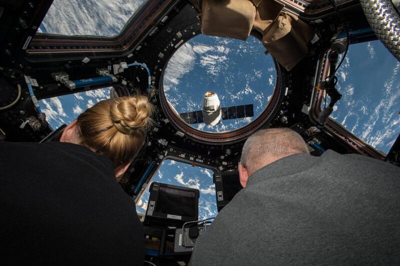 International Space Station (ISS) Expedition 48 crew members Kate Rubins, left, and Jeff Williams, right, preparing to grapple the SpaceX Dragon supply spacecraft from aboard the ISS, in space. Rubins and Williams successfully conducted a spacewalk to install the first of two international docking adapters (IDAs). The new docking port will enable the future arrival of US commercial crew spacecraft. Nasa handout / EPA