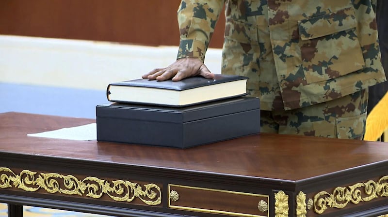 A pictured released by Sudan's Presidential Palace shows General Abdel Fattah al-Burhan, the head of Sudan's ruling military council, during a swearing in ceremony in Khartoum on August 21, 2019. Burhan was sworn today as chairman of Sudan's new sovereign council that will steer the country through a three-year transition to civilian rule. "General Abdel Fattah al-Burhan Abdel Rahman was sworn in as president of the sovereign council," the official SUNA news agency reported.
 / AFP / SUDAN PRESIDENTIAL PALACE / - /  RESTRICTED TO EDITORIAL USE - MANDATORY CREDIT "AFP PHOTO / SUDAN PRESIDENTAIL PALACE" - NO MARKETING NO ADVERTISING CAMPAIGNS - DISTRIBUTED AS A SERVICE TO CLIENTS


